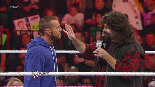 CM Punk y Mick Foley en WWE Monday Night RAW