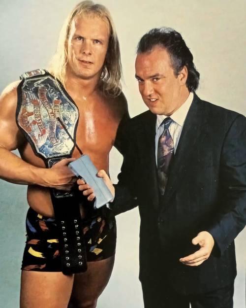 Steve Austin con Paul Heyman