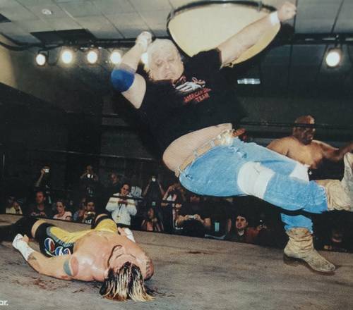 Dusty Rhodes, Dustin Rhodes y Mike Graham vs. CM Punk, Kevin Sullivan y Abdullah The Butcher en WrestleReunion 2005