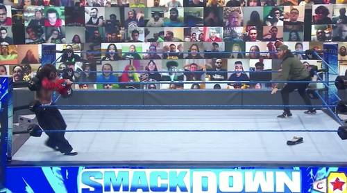 Sami Zayn atacando a Jeff Hardy y AJ Styles en SmackDown