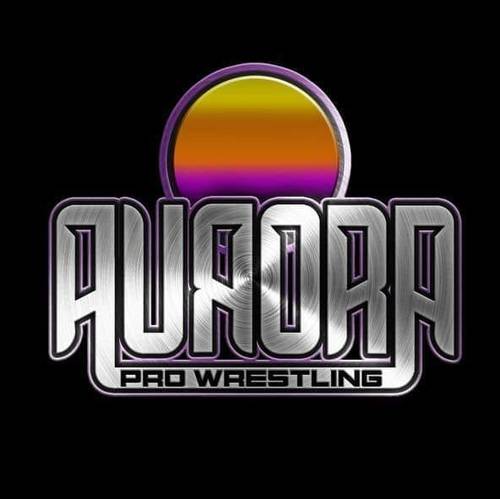 Superluchas - Logotipo de Aurora Pro Wrestling sobre fondo negro que muestra el evento Prominence el 17 de diciembre de 2023.