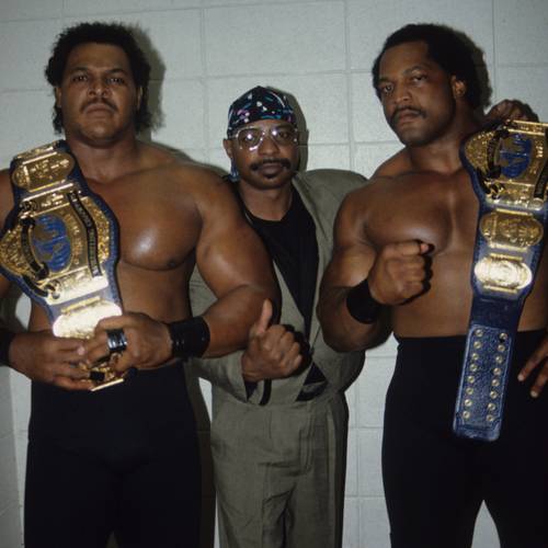 Butch Reed y Ron Simmons con Teddy Long